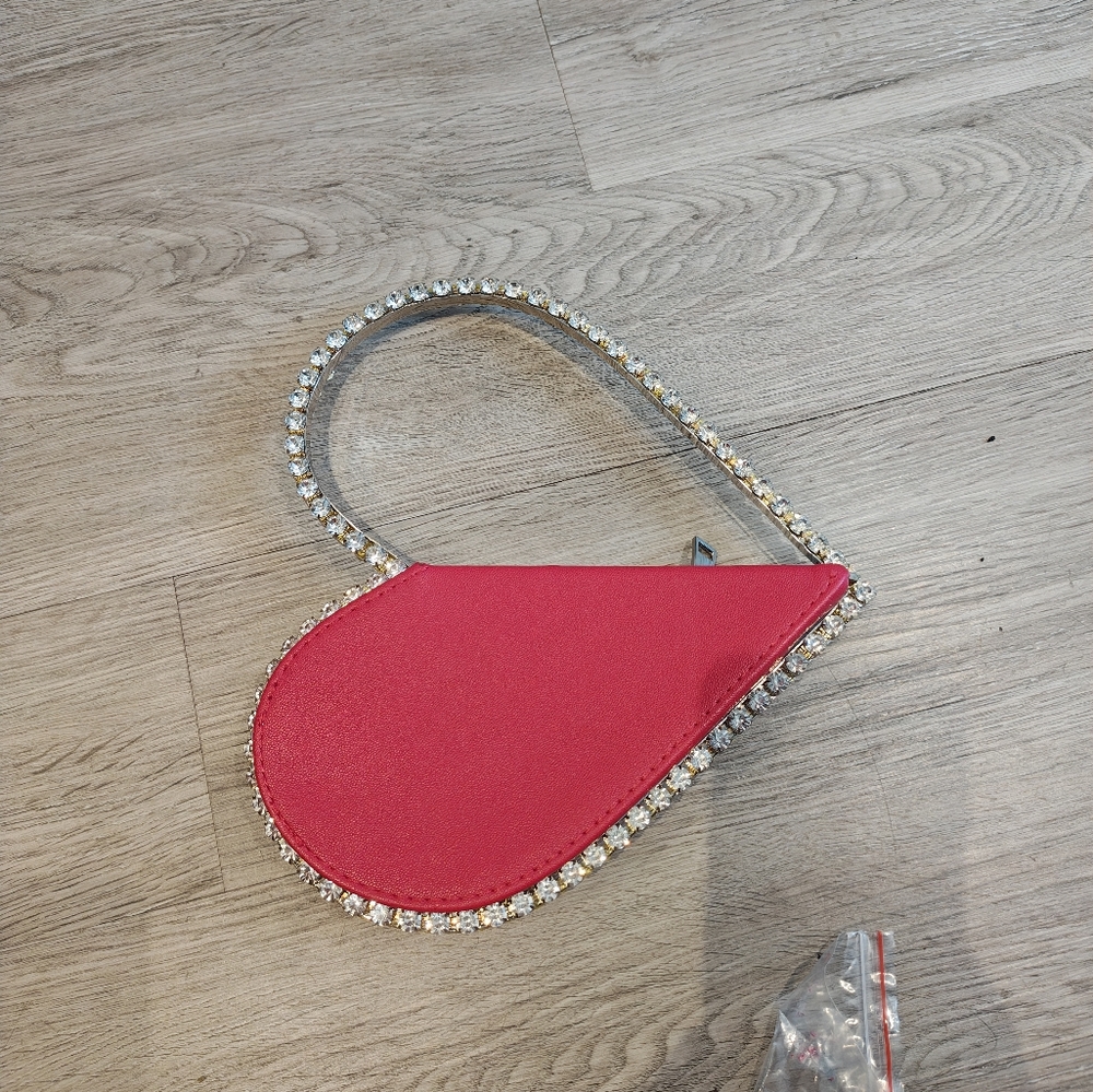 Heart-Shaped Red and Silver Clutch